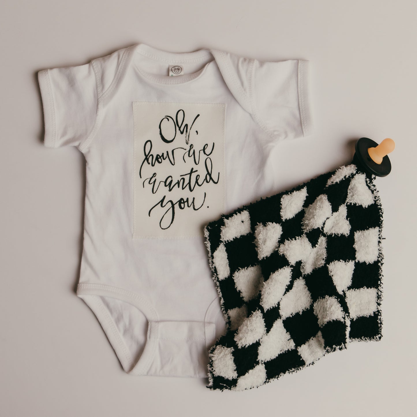 “Oh How We Wanted You” Onesie